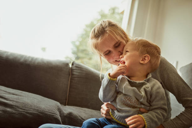 Shot of an adorable little boy spending some fun quality time with his mother at home