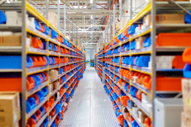 istock Diminishing perspective of warehouse racks 1198569148