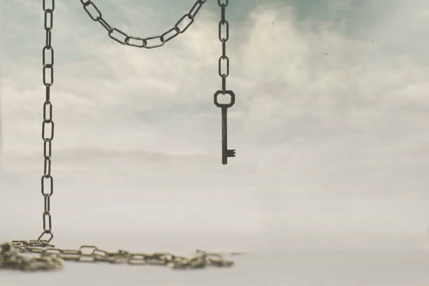 istock surreal key coming down from the sky, concept of freedom; property; solution; knowledge; power; protection 1198570811