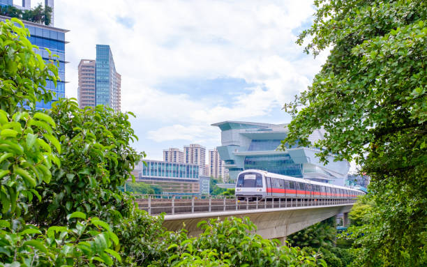 Singapore mrt train view from green forest day view Singapore-22 DEC 2017:Singapore mrt train view from green forest singapore mrt stock pictures, royalty-free photos & images