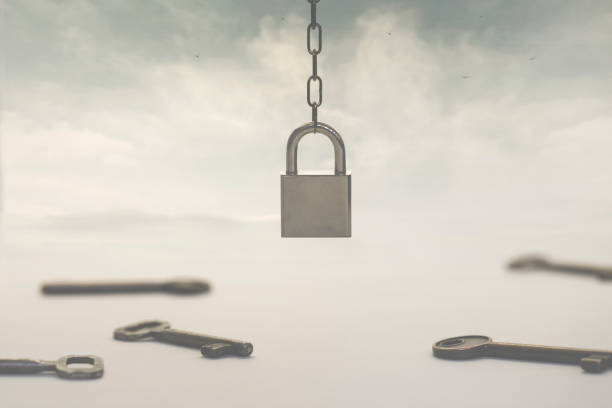 istock surreal hanging padlock that looks for the key that will open it 1198571376