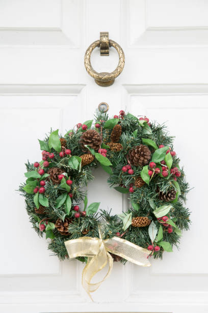 istock Christmas Wreath White on Front Door 1198571578