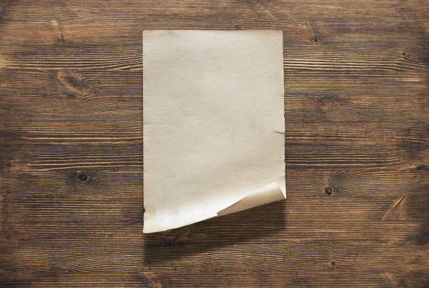 istock paper on wooden wall 1198572616