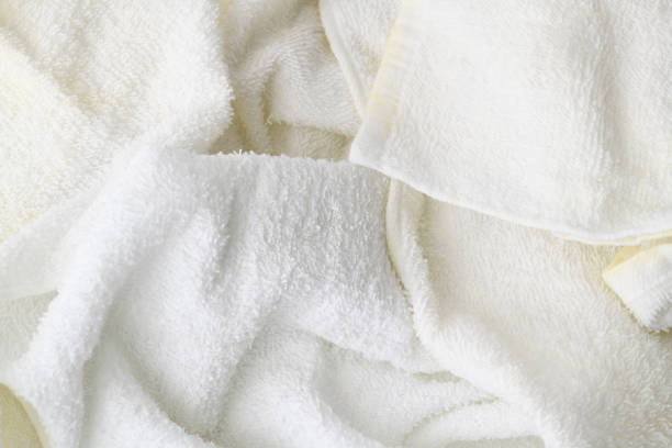 istock Extreme close-up of old white towel texture background. 1198572800