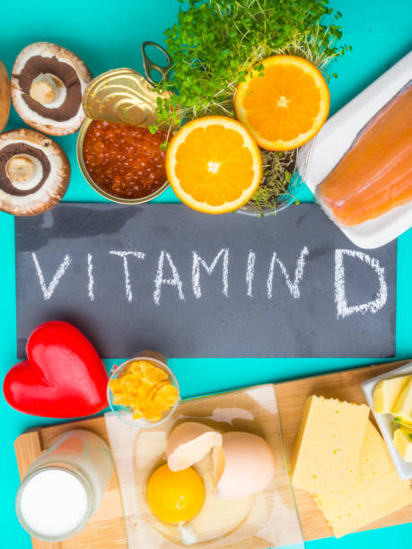 istock Products containing vitamin D on blue background, top view 1198572975