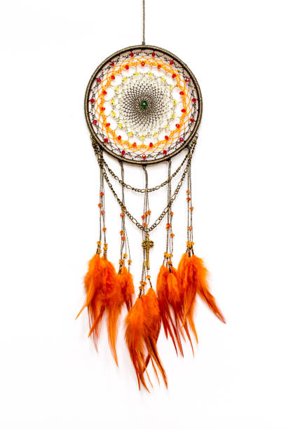 istock Handmade dream catcher with feathers threads and beads rope hanging 1198574699