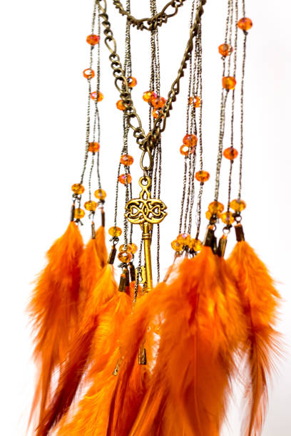 istock Handmade dream catcher with feathers threads and beads rope hanging 1198574710
