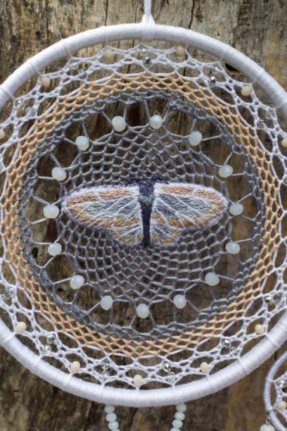 Handmade dream catcher with feathers threads and beads rope hanging