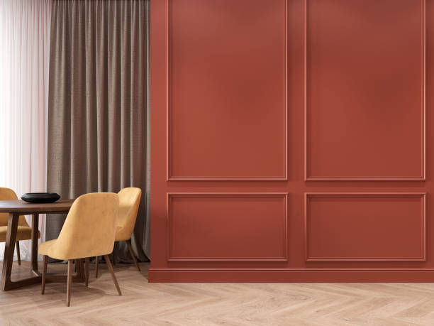 istock Modern classic red interior with moldings, wood floor, dinner table, yellow chairs and curtains. 3d render interior mock up. 1198575901