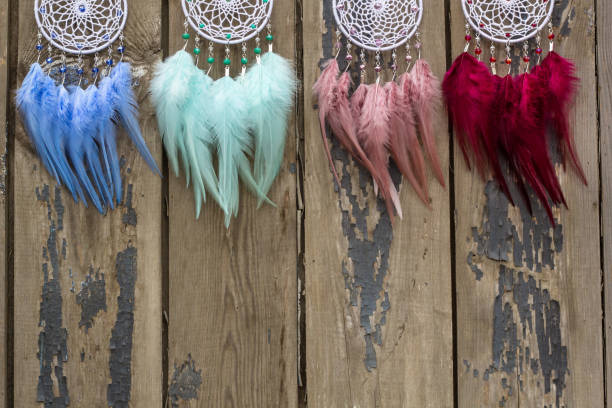 istock Many Handmade dream catcher with feathers threads and beads rope hanging 1198576660