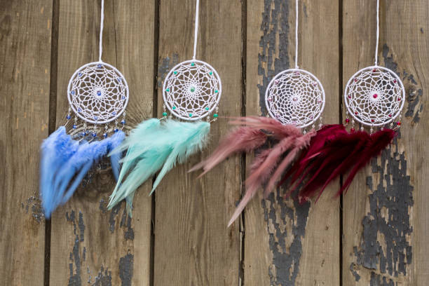 istock Many Handmade dream catcher with feathers threads and beads rope hanging 1198576665