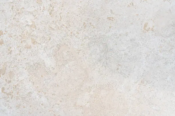 Photo of Beige limestone similar to marble natural surface or texture for floor or bathroom
