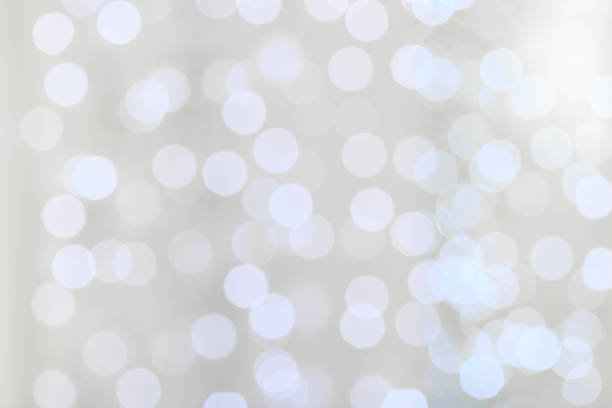 istock Decorative christmas background with bokeh lights and snowflakes 1198577761