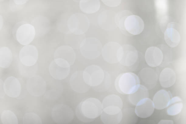 istock Decorative christmas background with bokeh lights and snowflakes 1198577772
