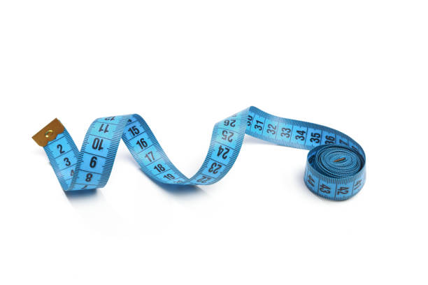 istock Blue measuring tape isolated on white background 1198577774