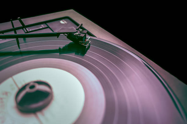 istock Old colorful Vinyl disc playing music, background image 1198578150