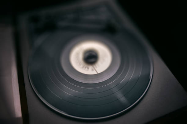 istock Old colorful Vinyl disc playing music, background image 1198578287