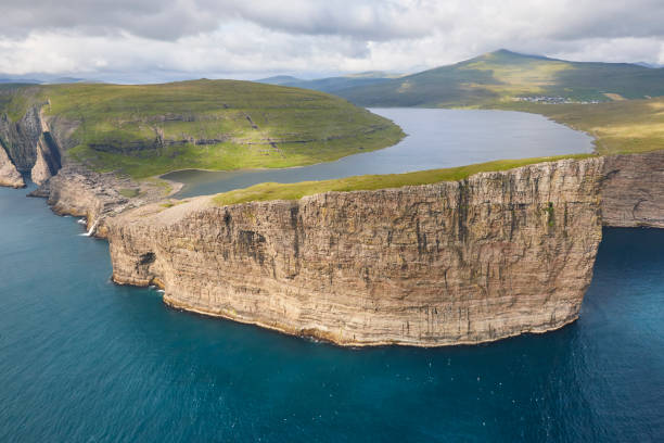 istock Faroe islands dramatic coastline in Vagar. Leitisvatn lake 1198582319