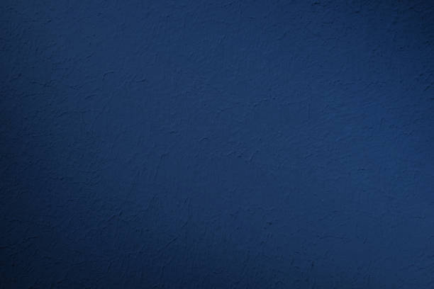 istock Bright blue stucco texture background on old wall. Trend hue, classic blue. 1198582395