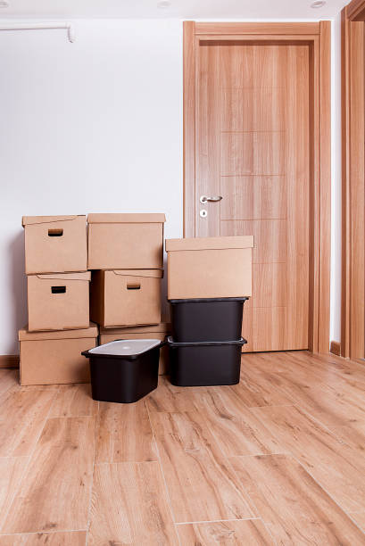 istock Moving boxes in new house. Real estate concept. 1198584160