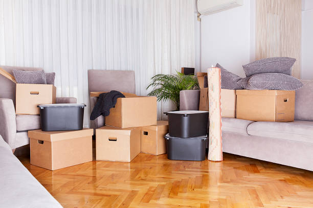 istock Moving boxes in new house. Real estate concept. 1198585167