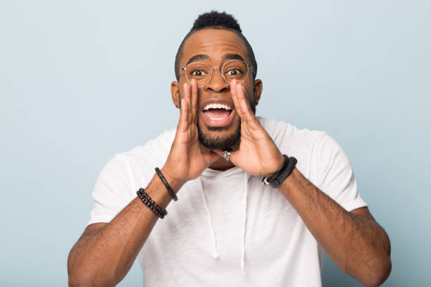 istock African American man scream making big announcement 1198585730