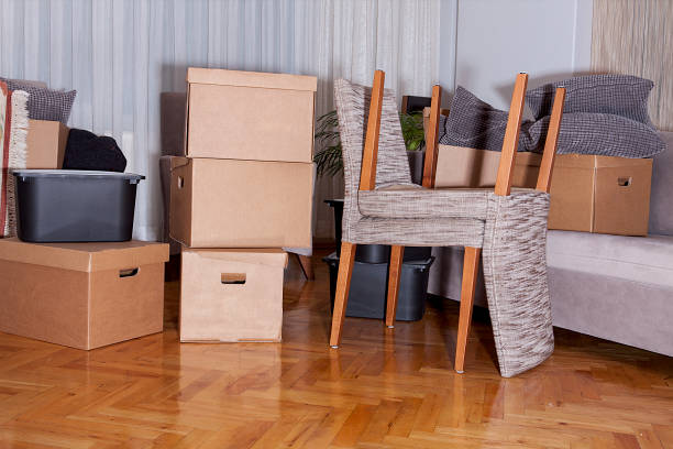 istock Moving boxes in new house. Real estate concept. 1198586796