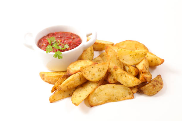 fried potato and tomato sauce isolated on white background