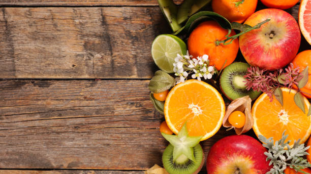 istock assorted of fruit, orange- kiwi-lemon- grapefruit and apple 1198586898
