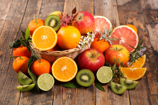 istock assorted of fruit, orange- kiwi-lemon- grapefruit and apple 1198586900