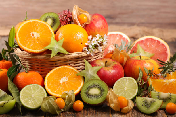 istock assorted of fruit, orange- kiwi-lemon- grapefruit and apple 1198586904