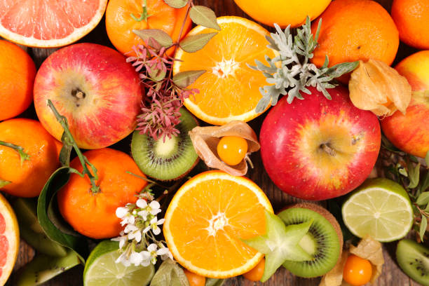 istock assorted of fruit, orange- kiwi-lemon- grapefruit and apple 1198586906