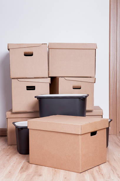 istock Moving boxes in new house. Real estate concept. 1198587622