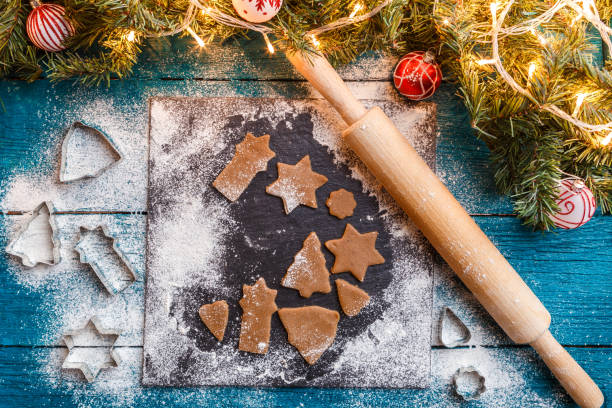 istock Photo of pine branches, dough, biscuit molds, rolling pin 1198590943