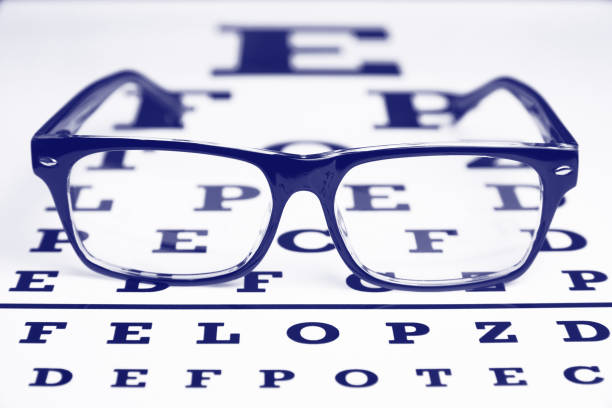 istock Glasses on the chart for eye examination. 1198590970