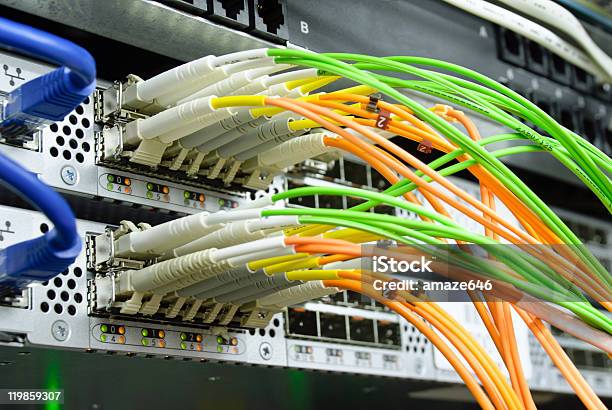 Optic Cables Connected To Router Ports Stock Photo - Download Image Now - Accessibility, Bandwidth, Cable