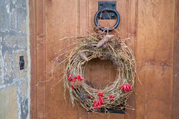 istock Red Peppers on Christmas Wreath 1198593884