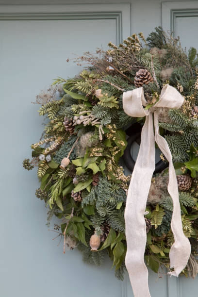 istock Green Leaf and Ribbon on Christmas Wreath 1198593905