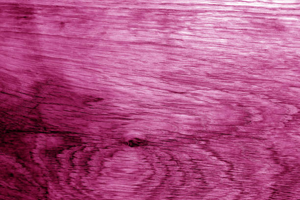 Wooden board texture in pink tone. Abstract background and texture for design.