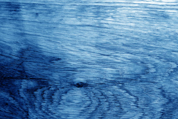Wooden board texture in navy blue tone. Abstract background and texture for design.