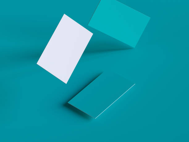 istock Business cards on colored desk 1198596435