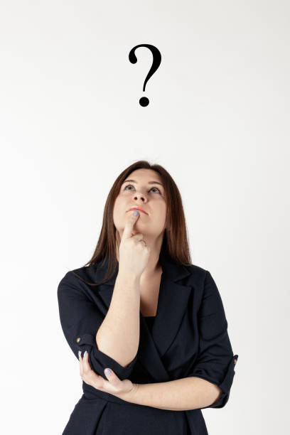 istock Young woman in blue and Question Mark. Question Mark. 1198596725