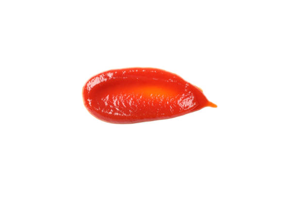 istock Ketchup spot isolated on white background, top view 1198598088