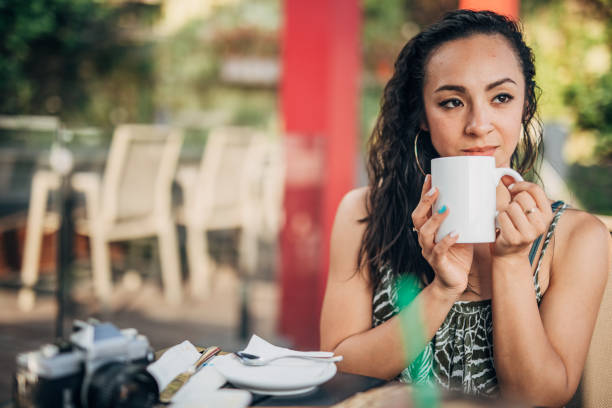 istock Woman drinking coffee 1198598645