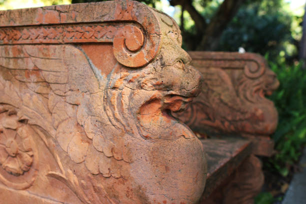 istock A garden bench with mythological creature sculptures, close up 1198602616