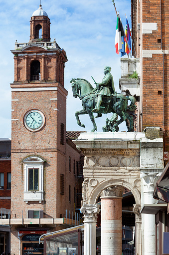 Ferrara, Emilia Romagna, Italy - Piazza del Municipio with the equestrian monument to Niccolò III d'Este and the clock tower