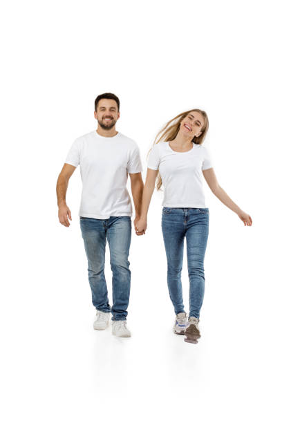 istock couple in casual outfit walking forward 1198604001