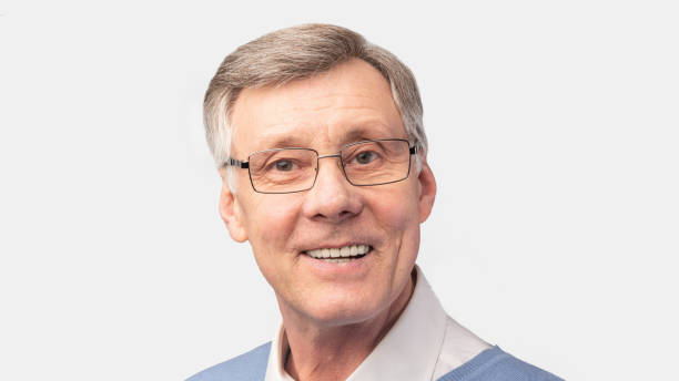 istock Smiling Senior Man Posing Over White Studio Background, Panorama 1198605453