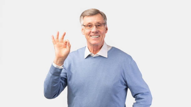 istock Happy Senior Gentleman Gesturing Okay Standing Over White Background, Panorama 1198606762