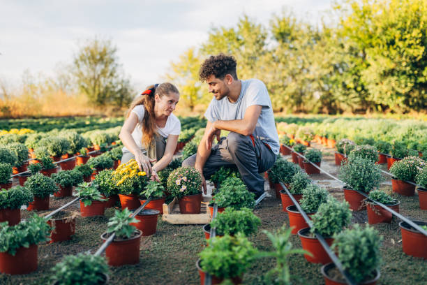 istock Young man and woman in garden 1198608321